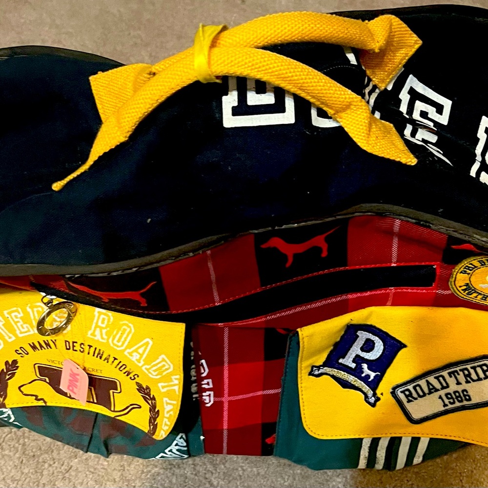 This is a Victoria secret rolling  bag.